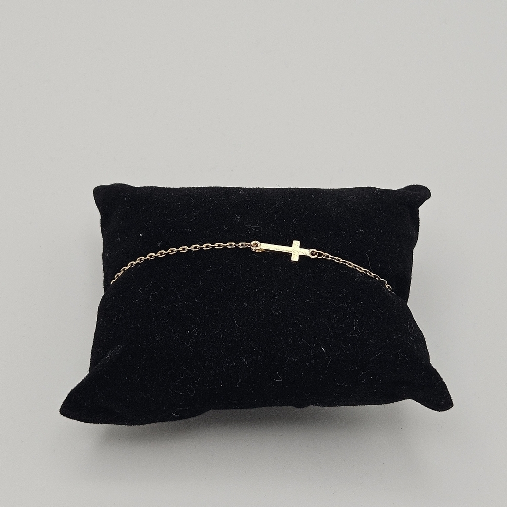 gold tone chain bracelet with cross charm